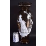 A LARGE LATE VICTORIAN ENAMELLED SMOKEY AMBER GLASS VASE possibly by Mary Gregory, painted with a f