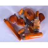 A MIXED GROUP OF AMBER CARVINGS, varying form. (10)