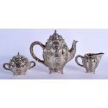 A GOOD 19TH CENTURY CONTINENTAL SILVER THREE PIECE TEASET decorated with figures within landscapes.