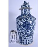 A 19TH CENTURY CHINESE BLUE AND WHITE VASE AND COVER Qing, painted with foliage and vines. 39 cm hi