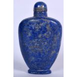 A CHINESE LAPIS LAZULI SNUFF BOTTLE, of plain form. 7.25 cm high.