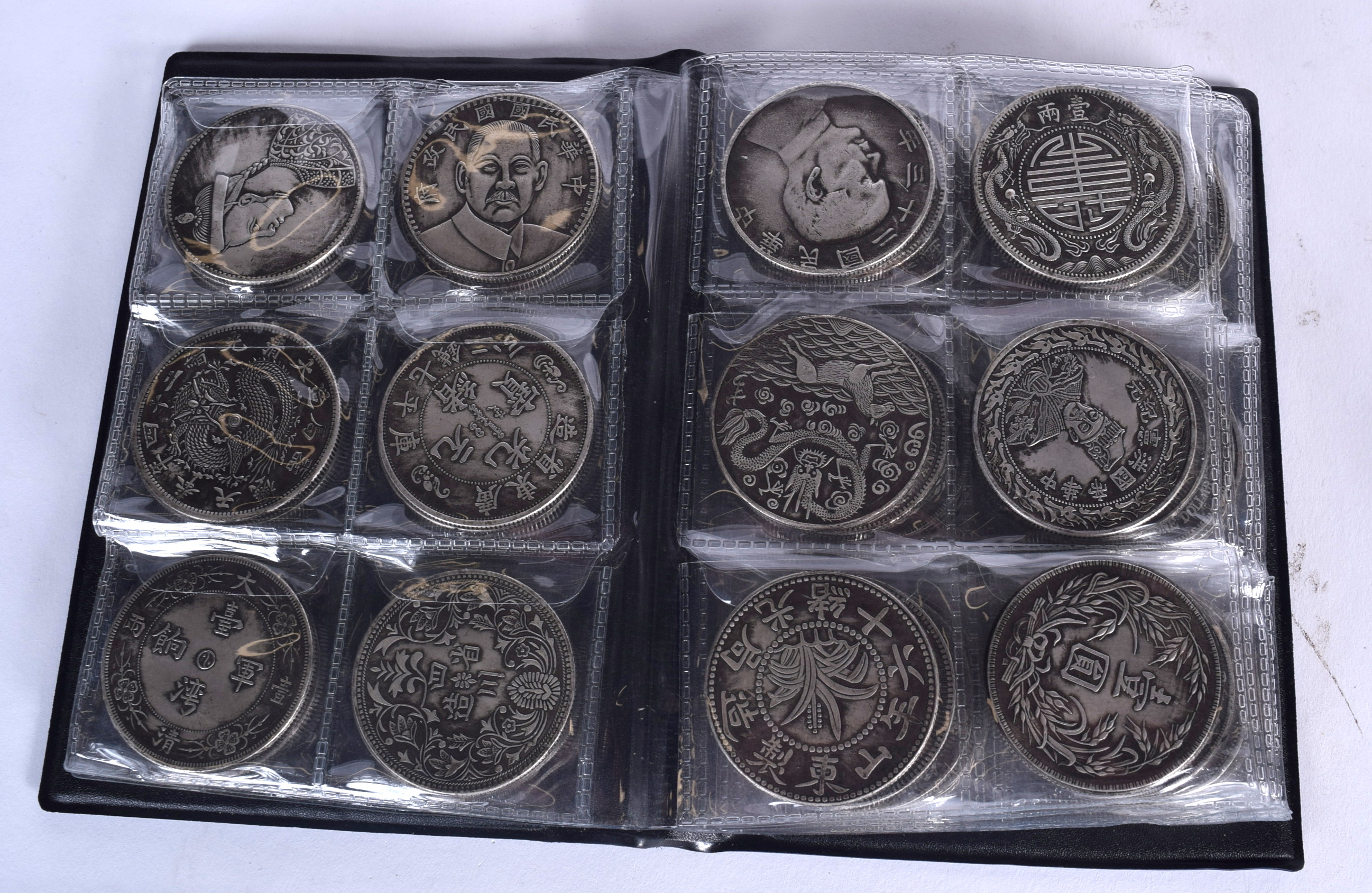 A COLLECTION OF CHINESE COINAGE, contained with a wallet. Wallet 15.5 cm x 9.5 cm. - Image 2 of 4