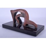A STYLISH 1960S ABSTRACT PATINATED IRON RED BRONZE SCULPTURE signed SVR. 20 cm wide.