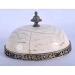 AN 18TH/19TH CENTURY ANGLO INDIAN CARVED IVORY PAPER WEIGHT decorated with an open foliate banding.