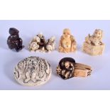 THREE 19TH CENTURY JAPANESE MEIJI PERIOD CARVED IVORY NETSUKES together with a carved boxwood netsu