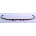 A TURKISH MIDDLE EASTERN LACQUERED HUNTING BOW painted with floral sprays and motifs. 89 cm long.