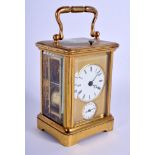A SMALL EARLY 20TH CENTURY FRENCH REPEATING CARRIAGE CLOCK. 12.5 cm high inc handle.