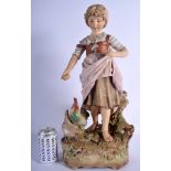 A LARGE ROYAL DUX PORCELAIN FIGURE OF A GIRL modelled feeding chickens. 51 cm x 19 cm.