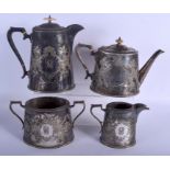 AN ANTIQUE SILVER PLATED FOUR PIECE TEASET. Largest 24 cm x 17 cm. (4)