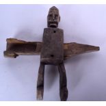 A MALIAN DOGON WOODEN GRANARY DOOR LOCK, figural in form. 38 cm x 40 cm.