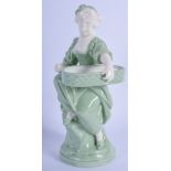 19th c. Minton celadon figure of a seated girl with an oval wicker basket on her knee. 18cm high