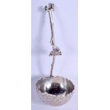 AN ANTIQUE LIBERTY & CO SILVER SUGAR SIFTER. 13 cm long. .