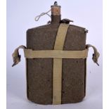A MILITARY WATER FLASK OR BOTTLE, with original cover. 24 cm x 15 cm.
