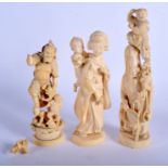 THREE 19TH CENTURY JAPANESE MEIJI PERIOD CARVED IVORY OKIMONO modelled in various forms and sizes.