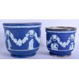 A 19TH CENTURY WEDGWOOD BLUE JASPERWARE PLANTER together with a smaller planter. Largest 16 cm x 14