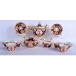 AN EARLY 19TH CENTURY SPODE 715 DOLLAR TREE TEASET painted with foliage and vines. Largest 24 cm x