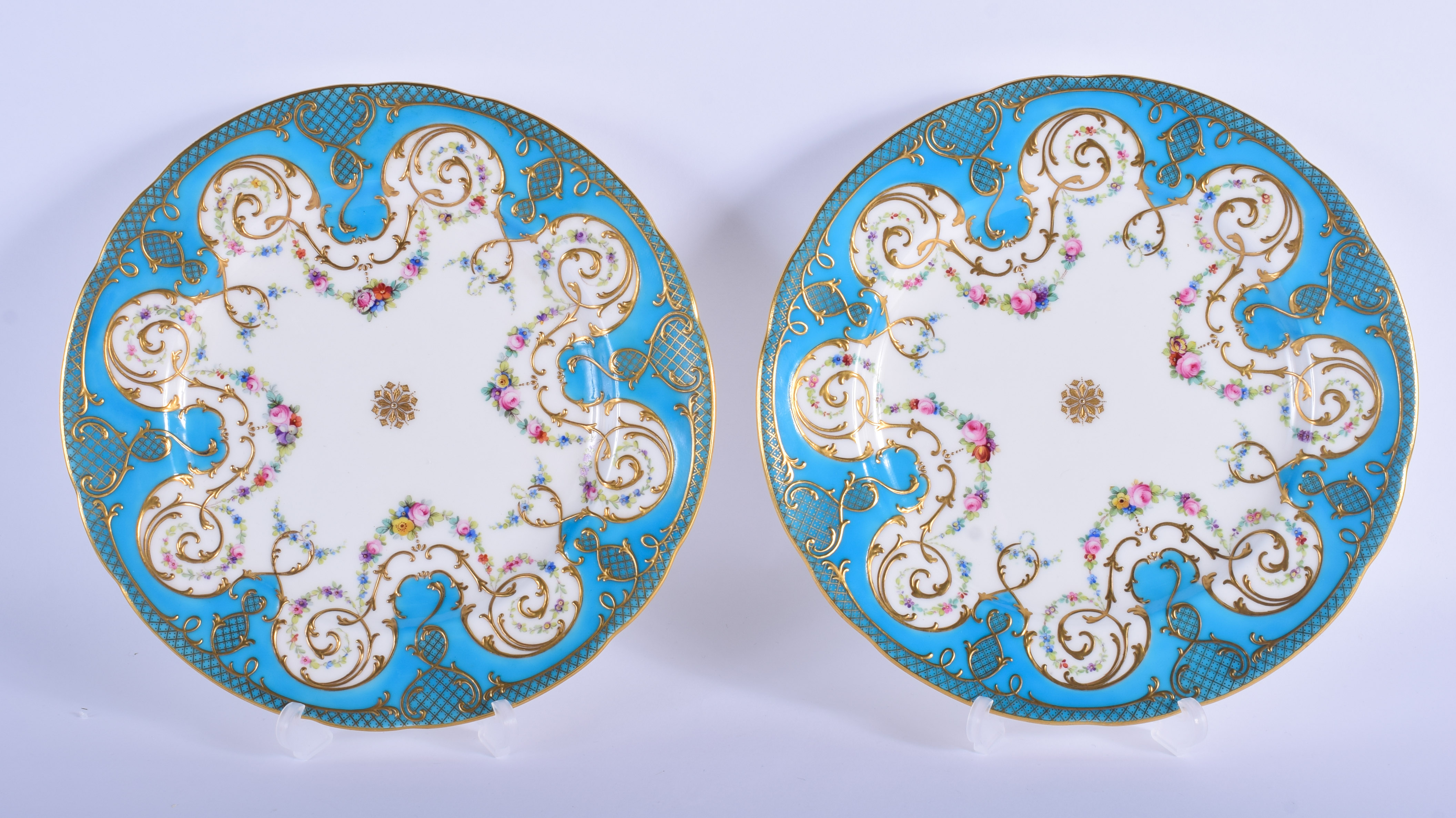 19th c. Minton Sevres style pair of plates painted with chains of flowers under a turquoise and gil