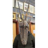 A BURKINA FASO BOBO GURUNSI TRIBE POLYCHROMED MASK, in the form of an antelope. 116 cm x 39 cm.