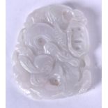 AN EARLY 20TH CENTURY CHINESE CARVED JADE PLAQUE PENDANT, forming mythical creatures amongst foliag