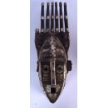 AN UNUSUAL CONGOLESE LULUA TYPE WOODEN MASK, formed with metal fittings creating facial detail. 51