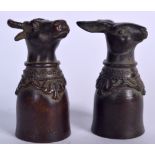 A BRONZE CUP IN THE FORM OF A BULL, together with a rabbit. 6 cm. (2)