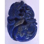 A CHINESE CARVED LAPIS BOULDER, forming a mythical beast, 20th century. 5 cm long.