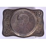 A CHINESE WHITE METAL BELT BUCKLE, decorated with a portrait. 7 cm wide.