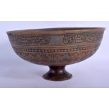 A 17TH CENTURY SAFAVID TINNED COPPER BOWL Persia, decorated with extensive scripture and foliage. 2