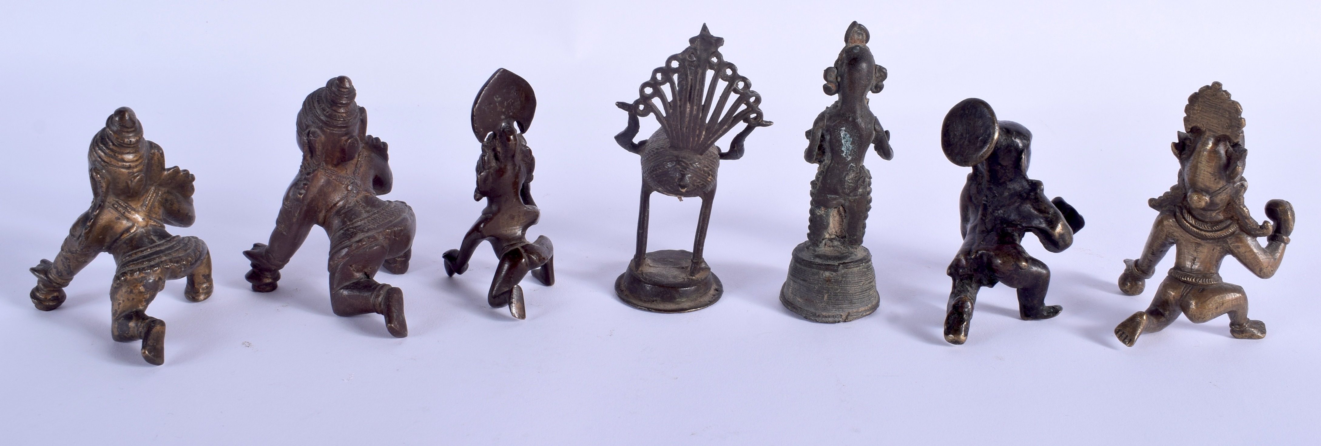 SEVEN 19TH CENTURY INDIAN BRONZE BUDDHISTIC DEITY in various forms and sizes. (7) - Bild 2 aus 2