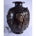 A VERY LARGE 19TH CENTURY JAPANESE MEIJI PERIOD BRONZE VASE by Genryusai Seiya, decorated in relief