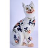 AN ANTIQUE FRENCH FAIENCE POTTERY CAT in the manner of Galle. 33 cm high.