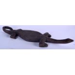 A MALIAN BAMBARA CARVED LIZARD, formed with an elongated neck. 61 cm long.