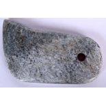 AN ANTIQUE MAORI CARVED STONE AXE HEAD. 7 cm x 11.5 cm.