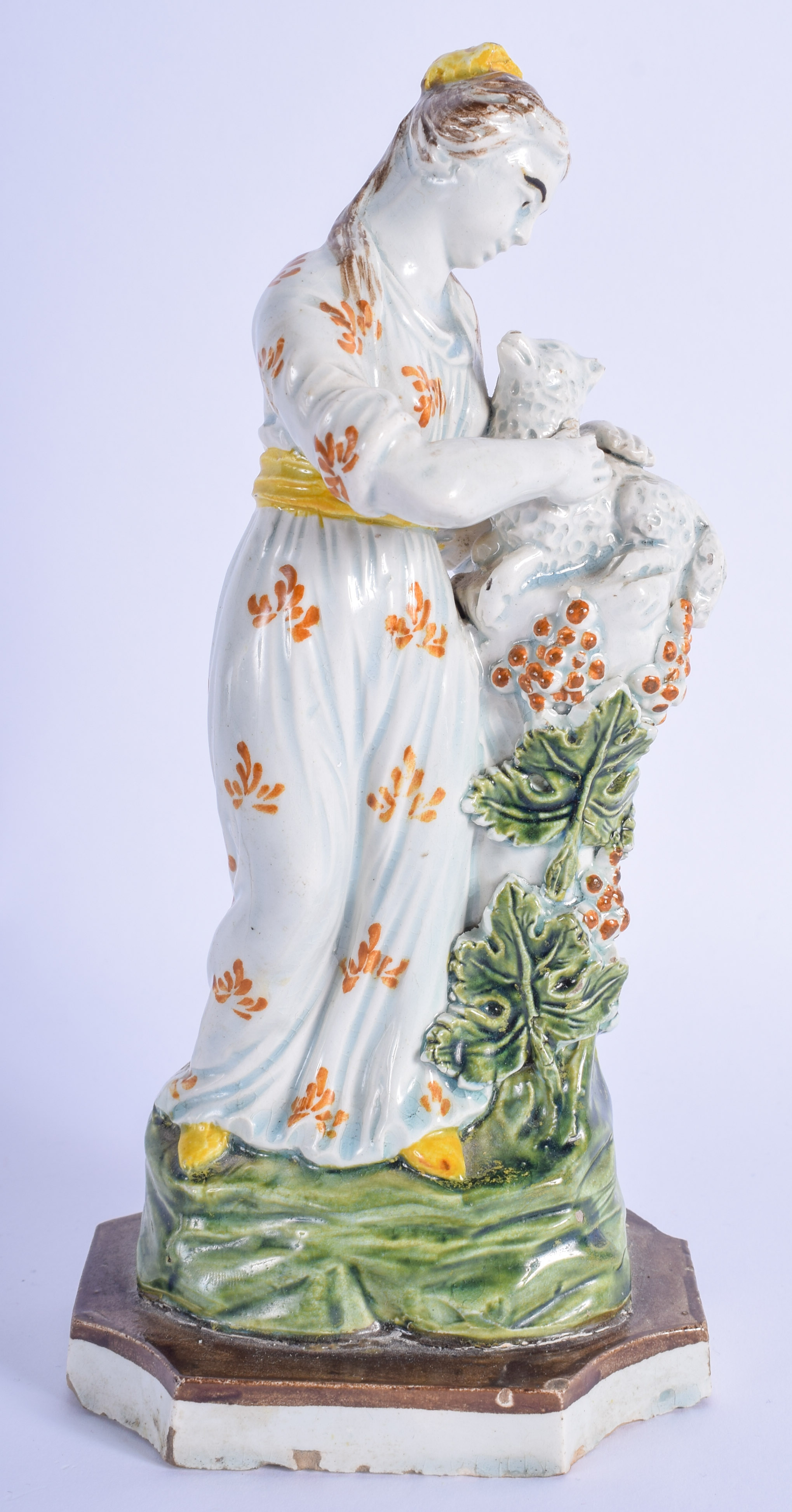 18th c. Staffordshire figure of a woman with a lamb. 19cm high