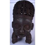 A LARGE WEST AFRICAN CARVED TWO SIDED WOODEN MASK, the head formed of spiders on one side and lizar
