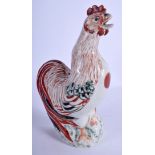 A CHARMING 17TH CENTURY JAPANESE EDO PERIOD ARITA PORCELAIN COCKEREL C1690, painted with feathers.