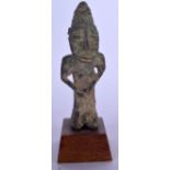 A NIGERIAN BRONZE STATUE, formed as a seated figure in a praying position. 17 cm high.