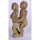 AN EROTIC HARDSTONE SCULPTURE, formed performing “The Standing Spoon”. 5.25 cm high.