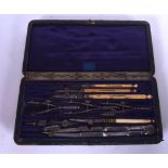 AN ANTIQUE CASED DRAWING SET BY F BLACKMORE, formed with ivory handles. Case 19.5 cm wide.