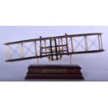 A FRANKLIN MINT MODEL OF THE WRIGHT FLYER, with associated stand. 31 cm wid.