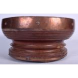 A LARGE INDIAN COPPER BOUND WOODEN BOWL, diamond shaped studwork to banding. 21 cm x 39 cm