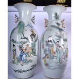 A LARGE PAIR OF MID 20TH CENTURY CHINESE FAMILLE ROSE PORCELAIN VASES, p[painted with figures in la