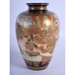 A 19TH CENTURY JAPANESE MEIJI PERIOD SATSUMA VASE painted with geisha within landscapes. 16.5 cm hi