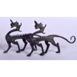 A PAIR OF CHINESE BRONZE MYTHICAL BEAST STATUE, formed standing. 15.5 cm wide.