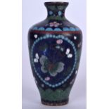A JAPANESE MEIJI PERIOD CLOISONNE ENAMEL BALUSTER VASE, decorated with butterflies and foliage. 11