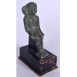 AN EGYPTIAN BRONZE SHABTI, formed seated upon a wooden plinth. 12 cm high.