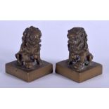 A PAIR OF 19TH CENTURY CHINESE BRONZE BUDDHISTIC LION SEALS. 7 cm wide.