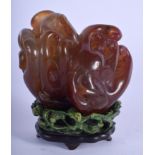 A MAJESTIC 18TH CENTURY CHINESE CARVED AGATE FINGER CITRON Qianlong, upon a stained ivory stand, of