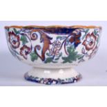 A LARGE ANTIQUE AMHERST JAPAN IRONSTONE PEDESTAL BOWL, decorated with foliage. 14.5 cm x 27 cm.