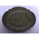 A CHINESE BRONZE PIN DISH, decorated in relief with a dragon an phoenix bird, signed. 14.5 cm wide.